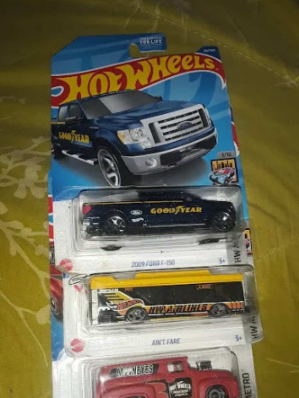 3 PC HOT WHEELS HW METRO 2009 FORD F-150, AIN'T FARE, AND '56 FORD F-100